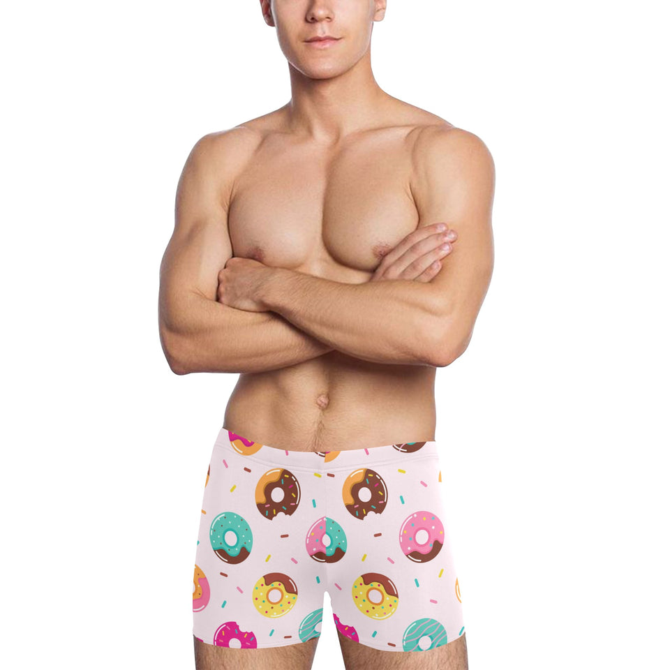 Donut pattern glaze pink background Men's Swimming Trunks