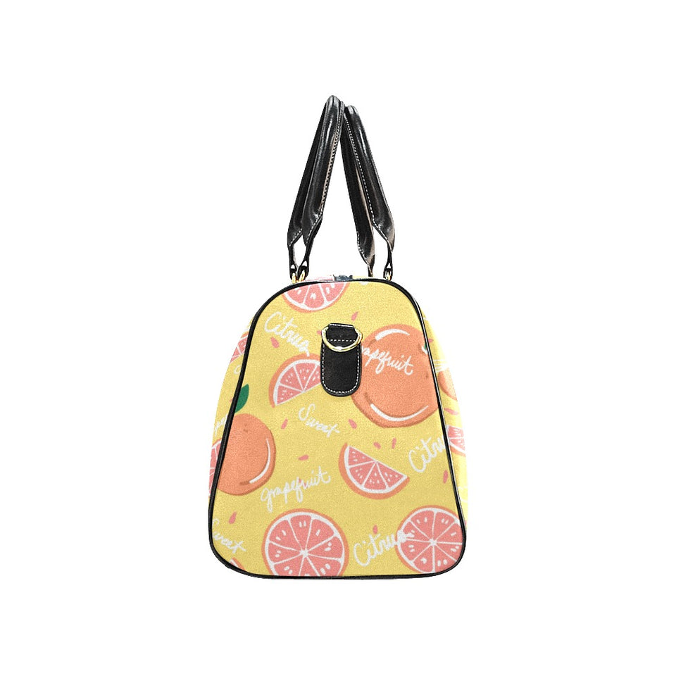 Grapefruit yellow background Travel Bag