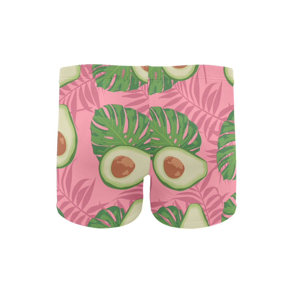 Avocado slices leaves pink back ground Men's Swimming Trunks