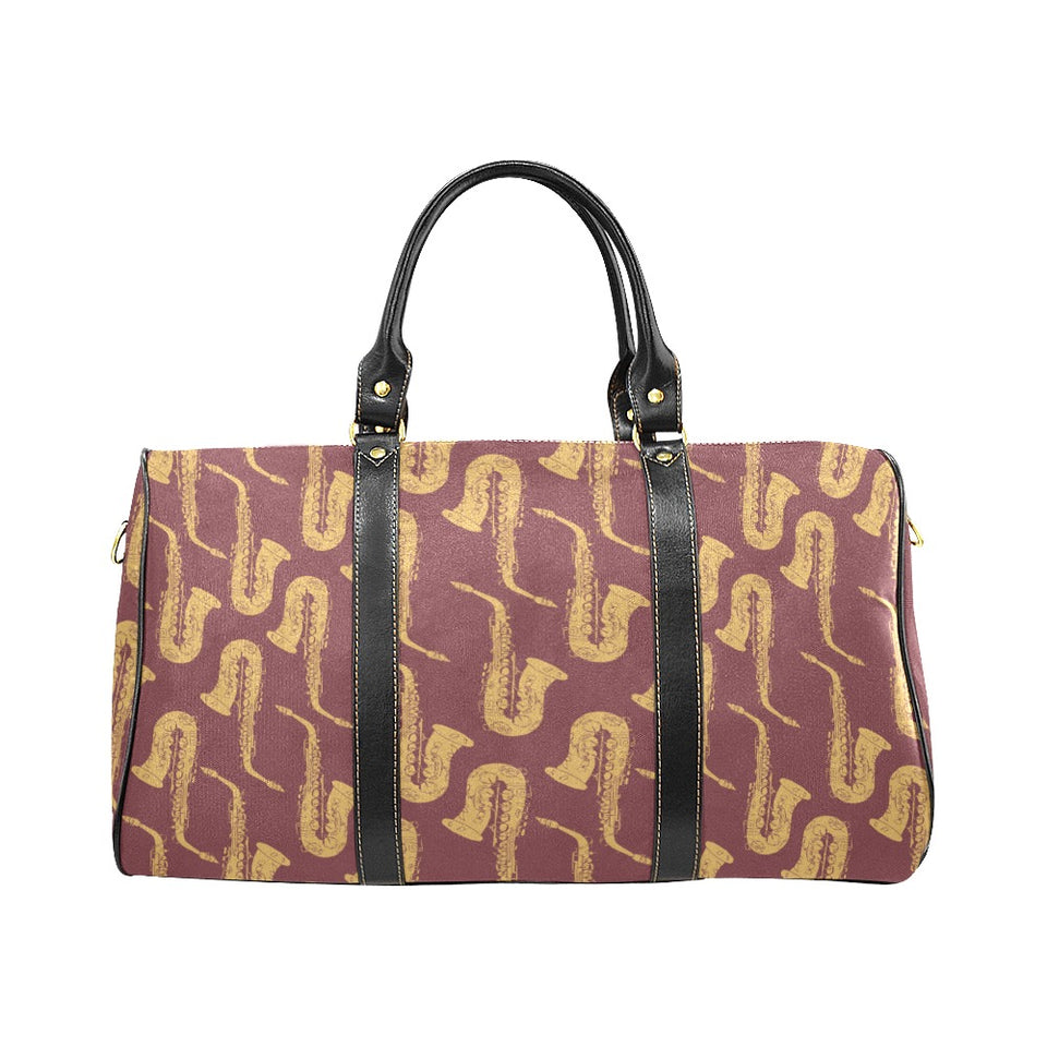 Hand drawn gold saxophone red background Travel Bag