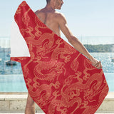 Gold dragons red background Beach Towel