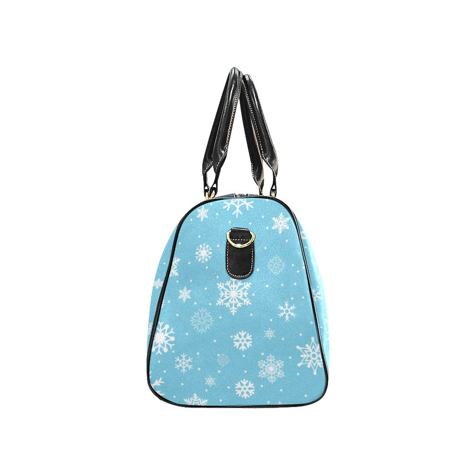Snowflake pattern blue background Travel Bag