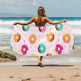 Donut pattern glaze pink background Beach Towel