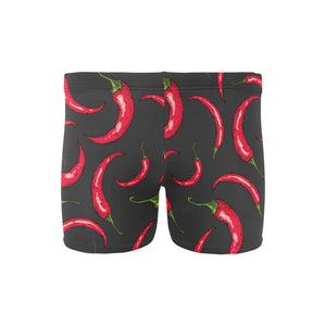 Chili peppers pattern black background Men's Swimming Trunks