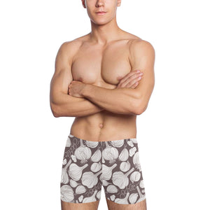 Garlic bulb dark background Men's Swimming Trunks