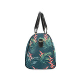 heliconia flowers, palm and monstera leaves on bla Travel Bag