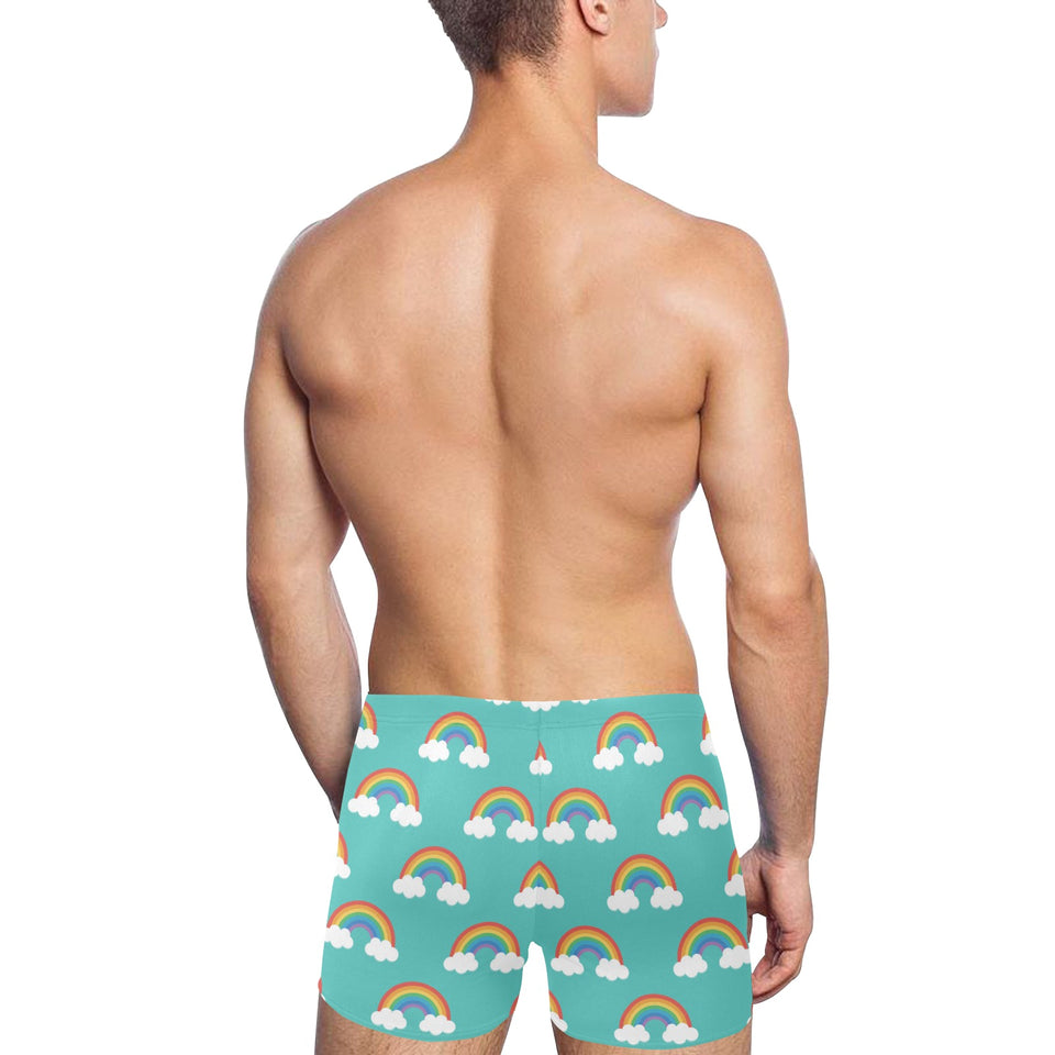 Rainbow pattern green background Men's Swimming Trunks