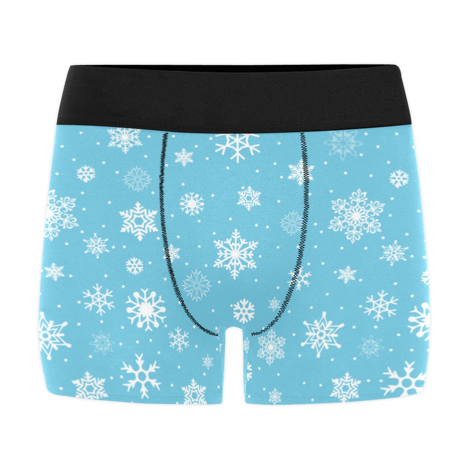Snowflake pattern blue background Men's All Over Print Boxer Briefs Men's Underwear