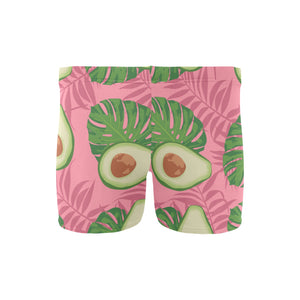 Avocado slices leaves pink back ground Men's Swimming Trunks