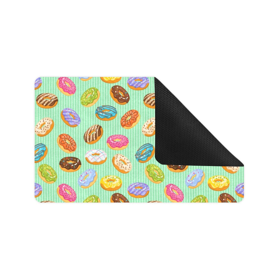 Colorful donut pattern green background Doormat