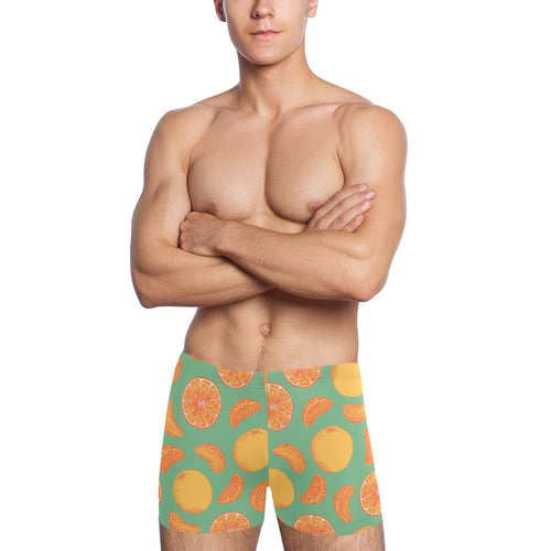 orange fruit pattern green background Men's Swimming Trunks