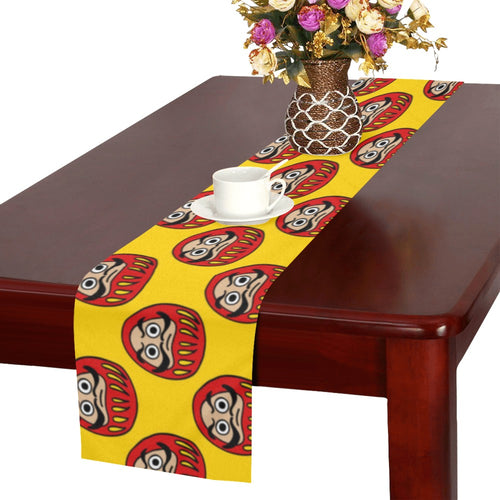 Daruma japanese wooden doll yellow background Table Runner