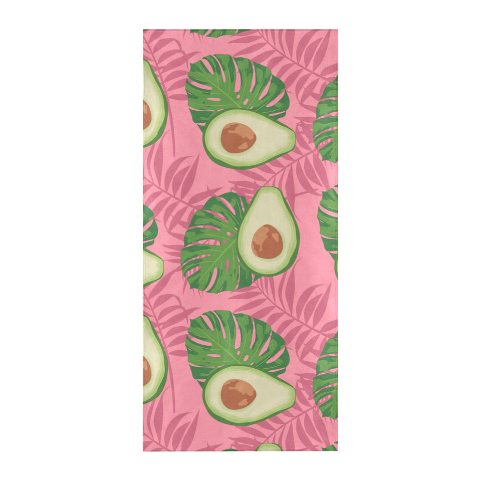 Avocado slices leaves pink back ground Beach Towel
