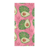 Avocado slices leaves pink back ground Beach Towel