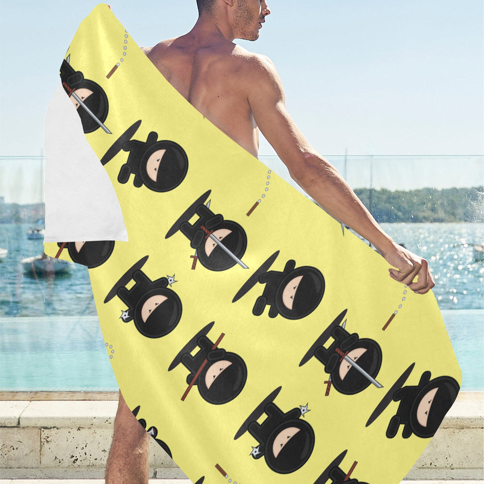 Cute ninja yellow background Beach Towel