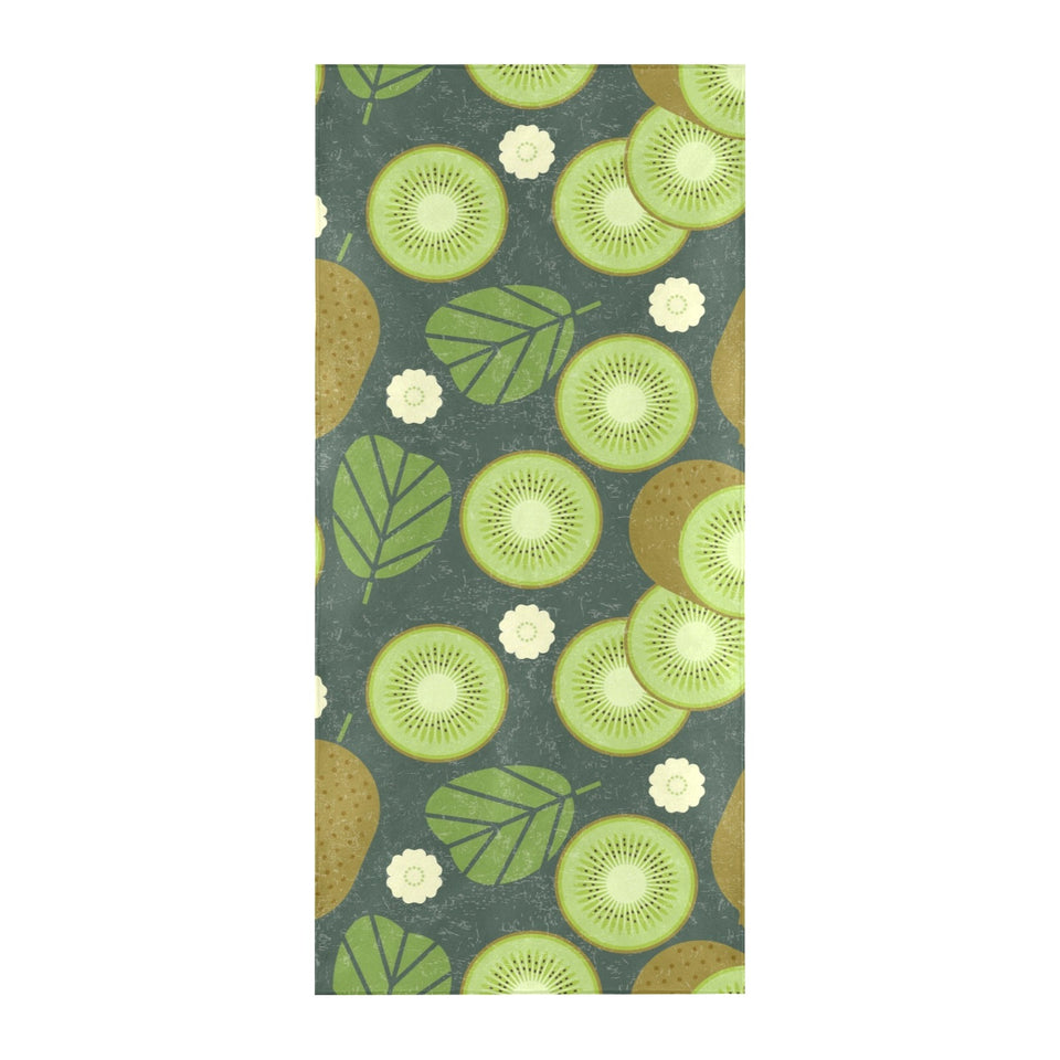Whole sliced kiwi leave and flower Beach Towel