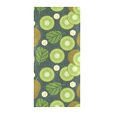 Whole sliced kiwi leave and flower Beach Towel