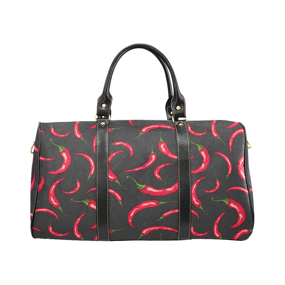 Chili peppers pattern black background Travel Bag