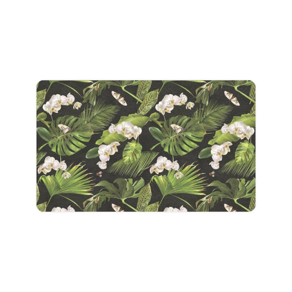 White orchid flower tropical leaves pattern blackg Doormat