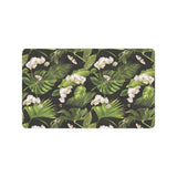 White orchid flower tropical leaves pattern blackg Doormat