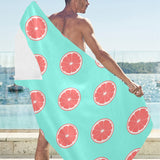 Grapefruit green background Beach Towel