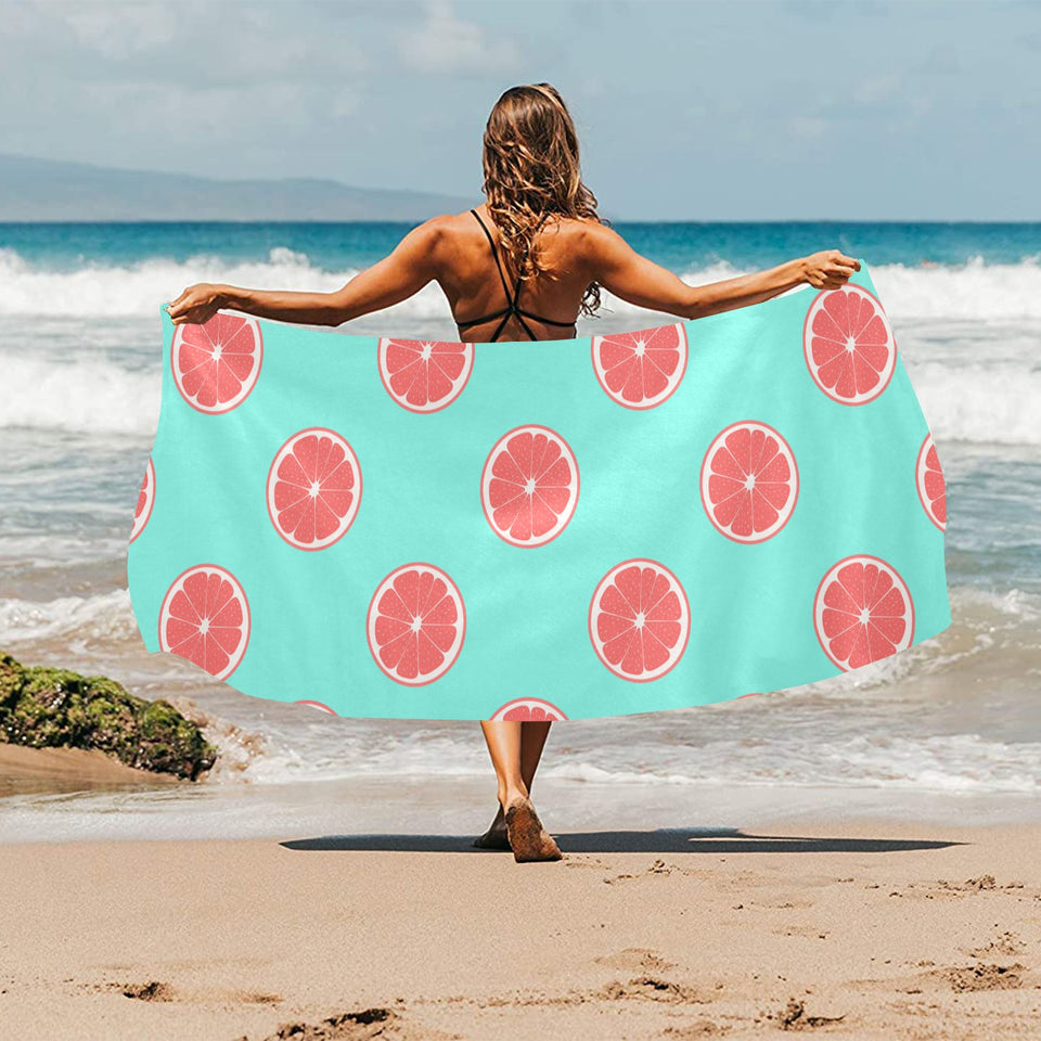 Grapefruit green background Beach Towel