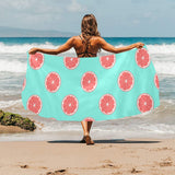 Grapefruit green background Beach Towel