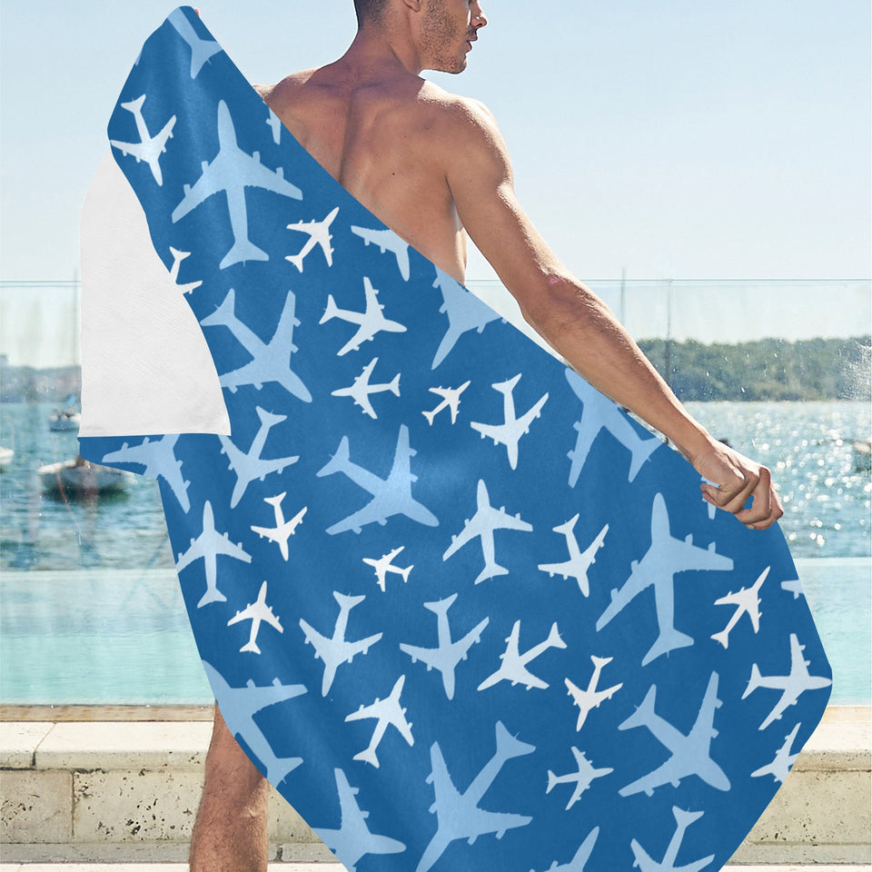 Airplane pattern in the sky Beach Towel