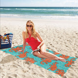 Octopus turquoise background Beach Towel