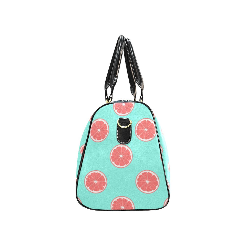Grapefruit green background Travel Bag