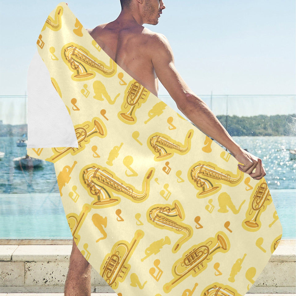 Saxophone cornet pattern yellow background Beach Towel