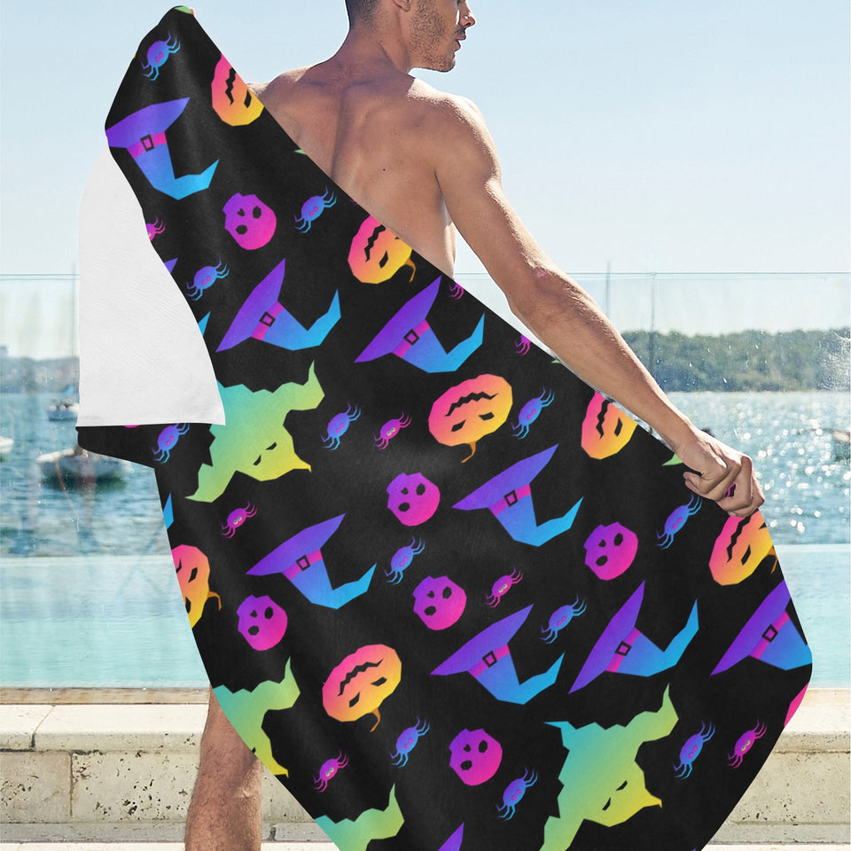 Colorful halloween background Beach Towel