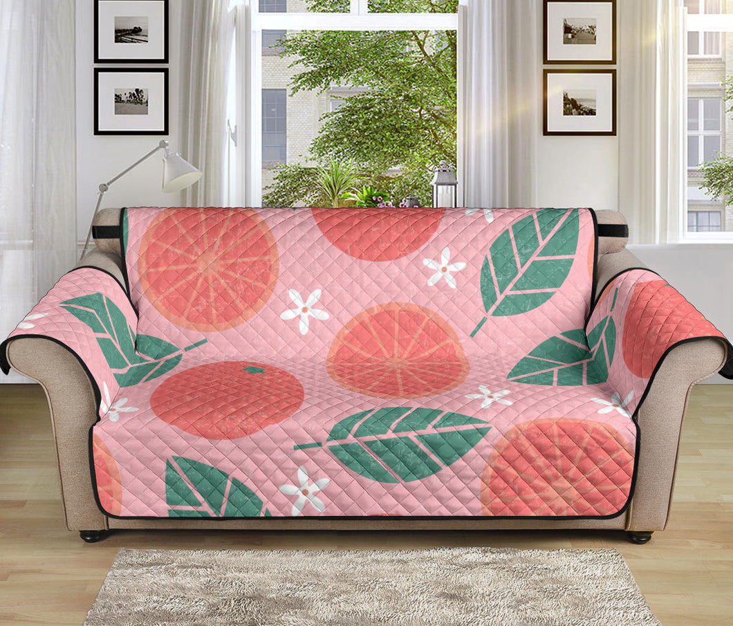 Grapefruit leaves flower pink background Sofa Cover Protector