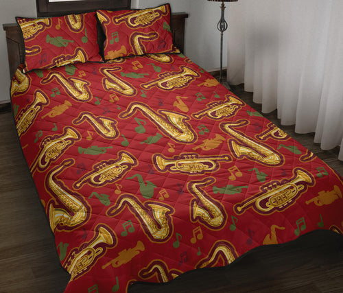 Saxophone cornet pattern red background Quilt Bed Set