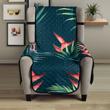 heliconia flowers, palm and monstera leaves on black background pattern Chair Cover Protector