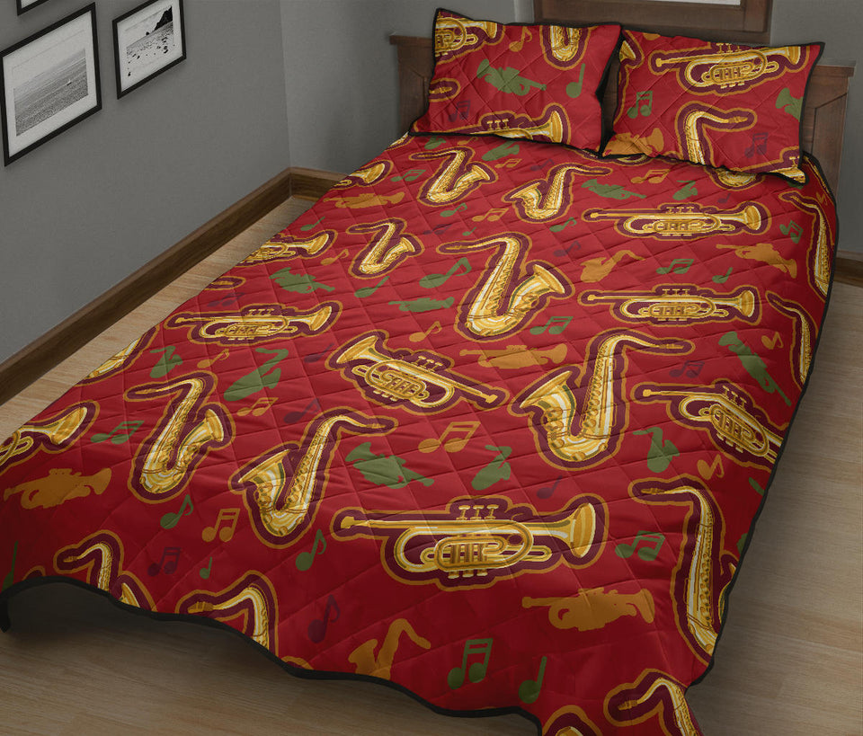 Saxophone cornet pattern red background Quilt Bed Set