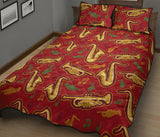 Saxophone cornet pattern red background Quilt Bed Set
