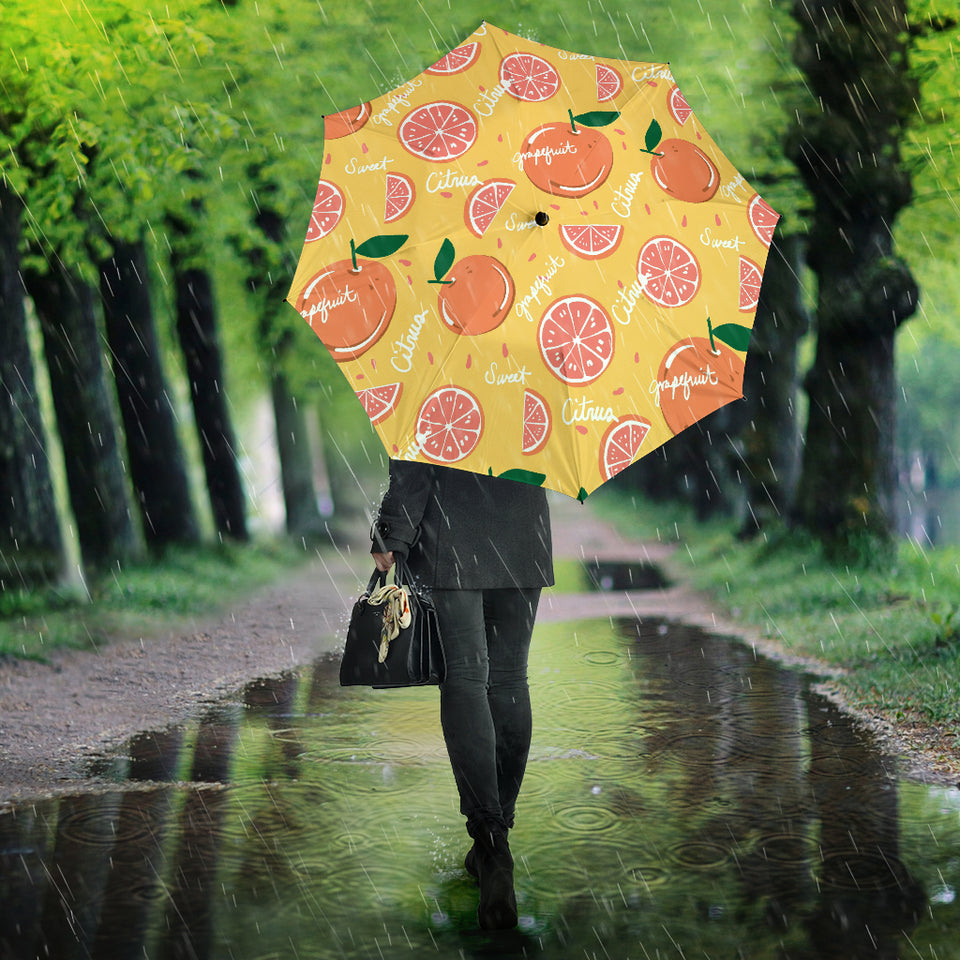 Grapefruit Yellow Background Umbrella