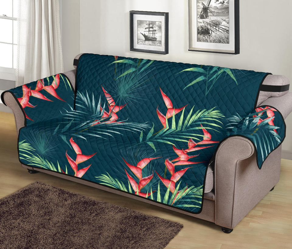 heliconia flowers, palm and monstera leaves on black background pattern Sofa Cover Protector