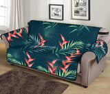 heliconia flowers, palm and monstera leaves on black background pattern Sofa Cover Protector