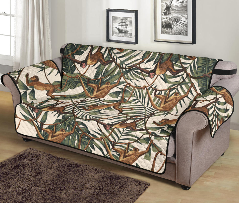 Monkey tropical leaves background Sofa Cover Protector