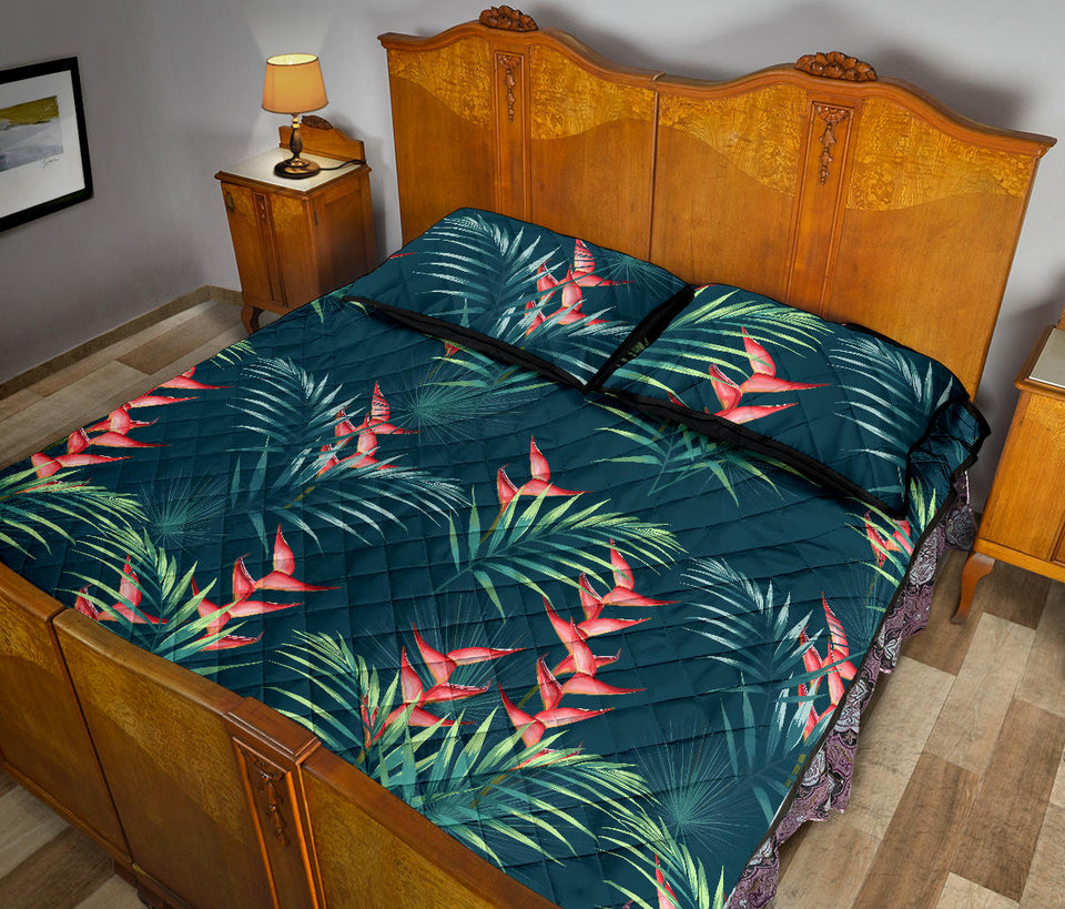 heliconia flowers, palm and monstera leaves on black background pattern Quilt Bed Set