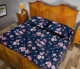 Pink sakura cherry blossom blue background Quilt Bed Set