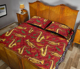 Saxophone cornet pattern red background Quilt Bed Set