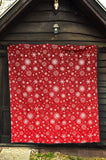 Snowflake Pattern Red Background Premium Quilt
